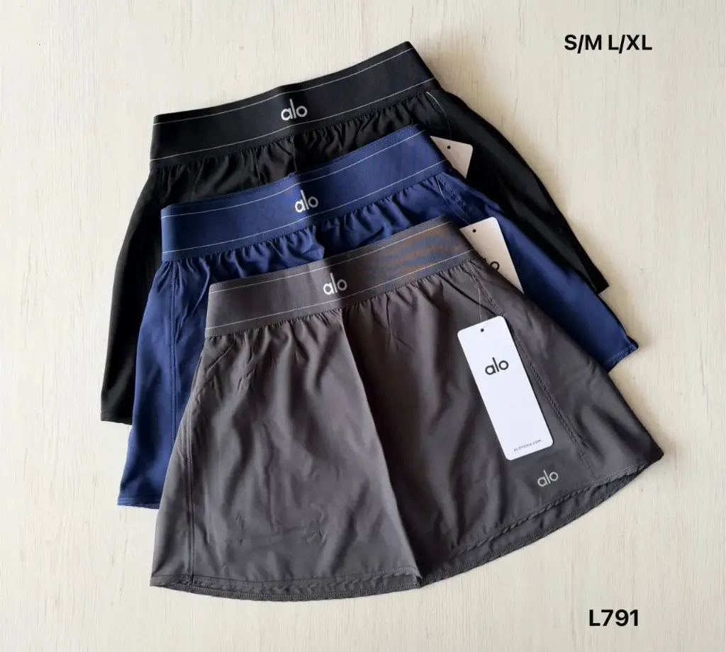 DOCENA - FALDA SHORT ALO CON BOLSILLO PREMIUM