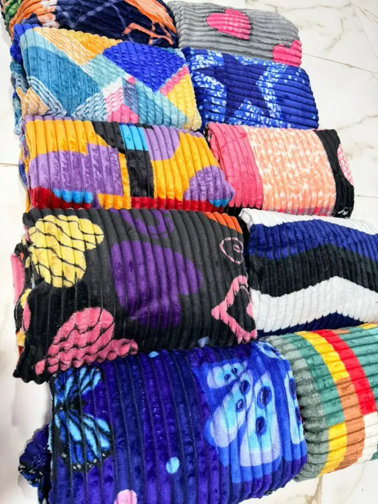 COBIJA PELUCHE ESTAMPADA - UNIDAD